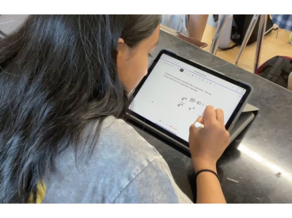 Photo of student using Snorkl app